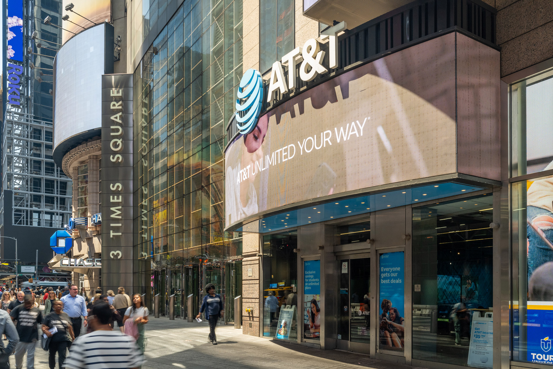 Image of 3 Times Square with people outside of the building